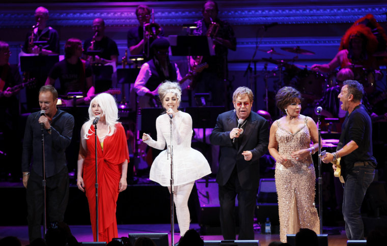 Image: Musicians (L-R) Sting, Debbie Harry, Lady Gaga, Elton John, Dame Shirley Bassey and Bruce Springsteen sing \"Don't Stop Believing\" during the 21st birthday celebration of the Rainforest Fund at Carnegie Hall in New York